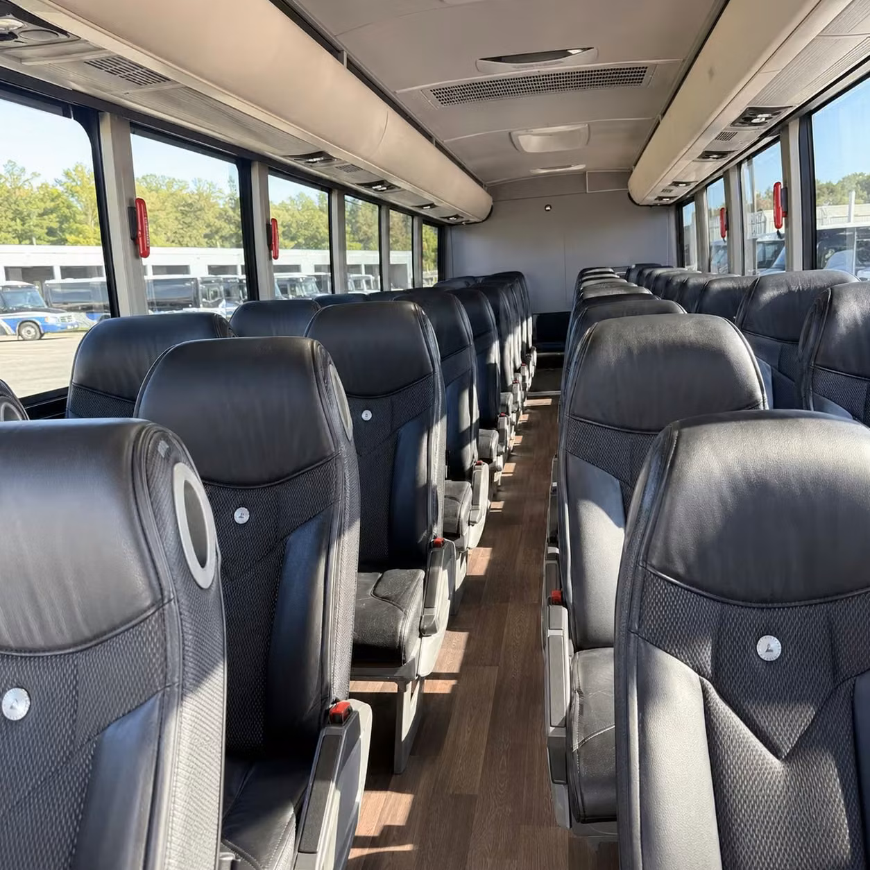 how trip distance and duration affect charter bus rates in lawrence